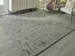 A2Z Furniture - Ashley Furniture - Jossland Rug - 5' x 7' Rug / Green/Ivory - R406912