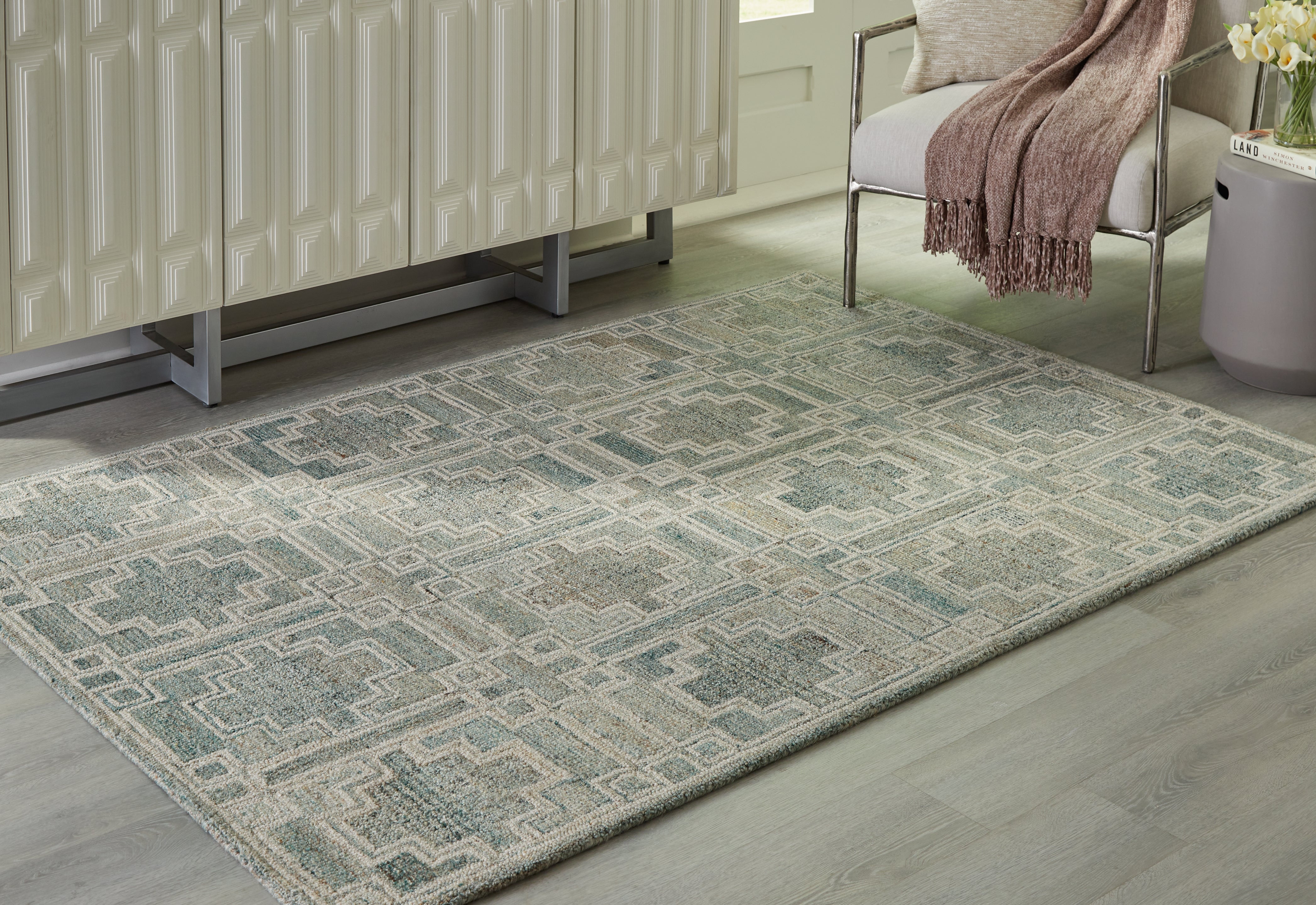 A2Z Furniture - Ashley Furniture - Jossland Rug - 5' x 7' Rug / Green/Ivory - R406912