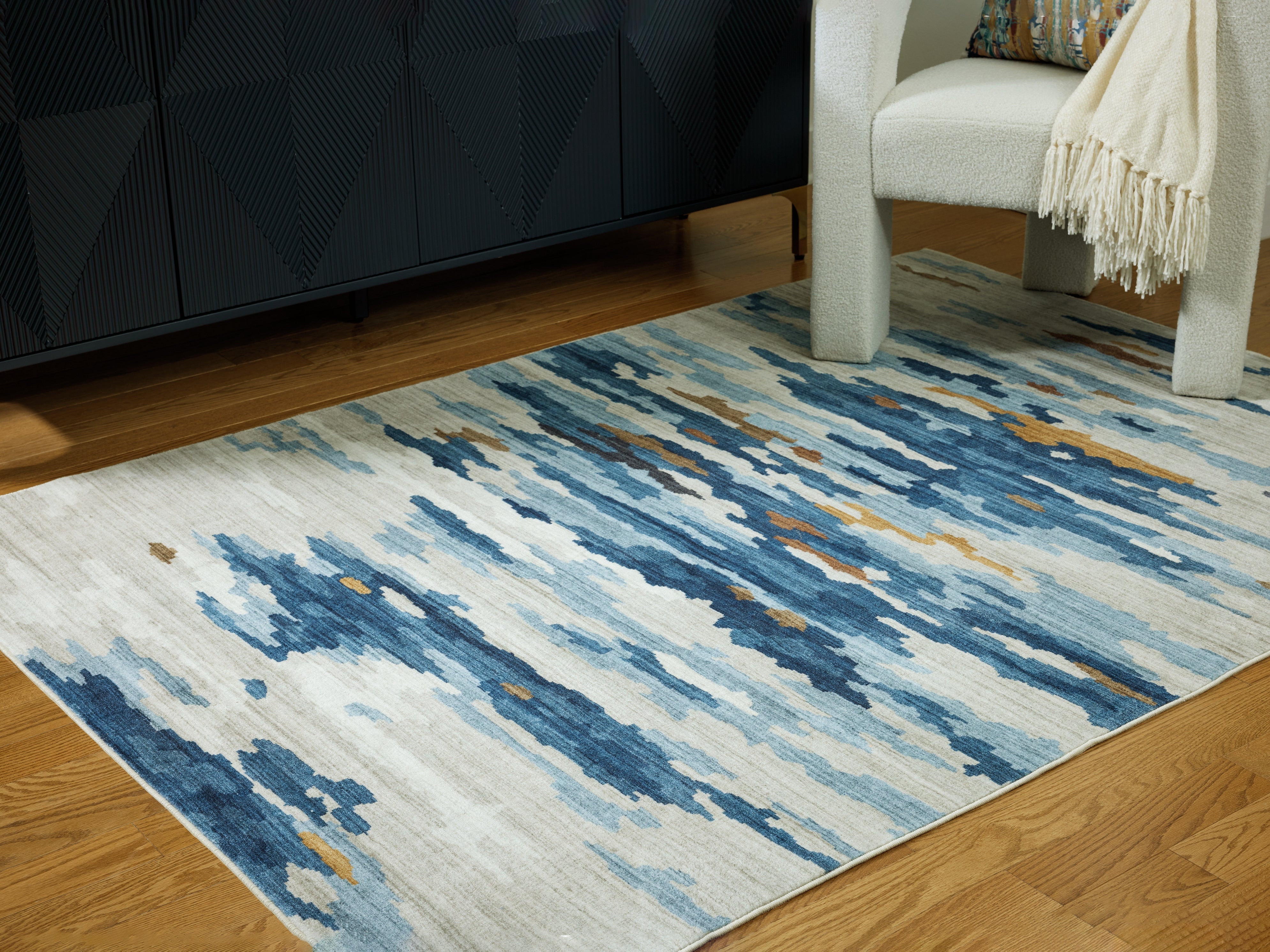 A2Z Furniture - Ashley Furniture - Vinlett Rug - 5' x 7' Washable Rug / Cream/Blue/Brown - R407042