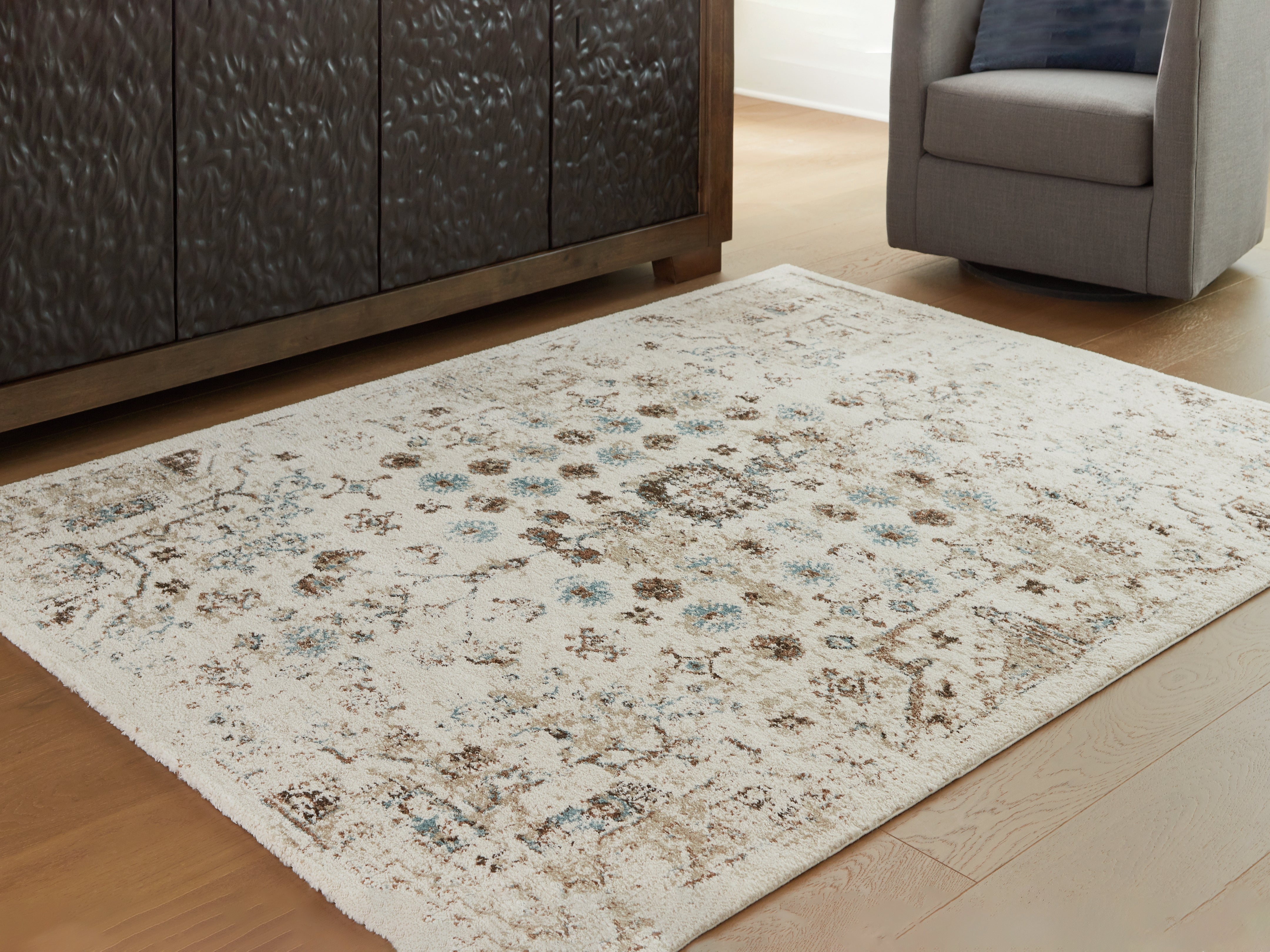 A2Z Furniture - Ashley Furniture - Jossler Rug - 8' x 10' Rug / Ivory/Brown/Teal - R407071