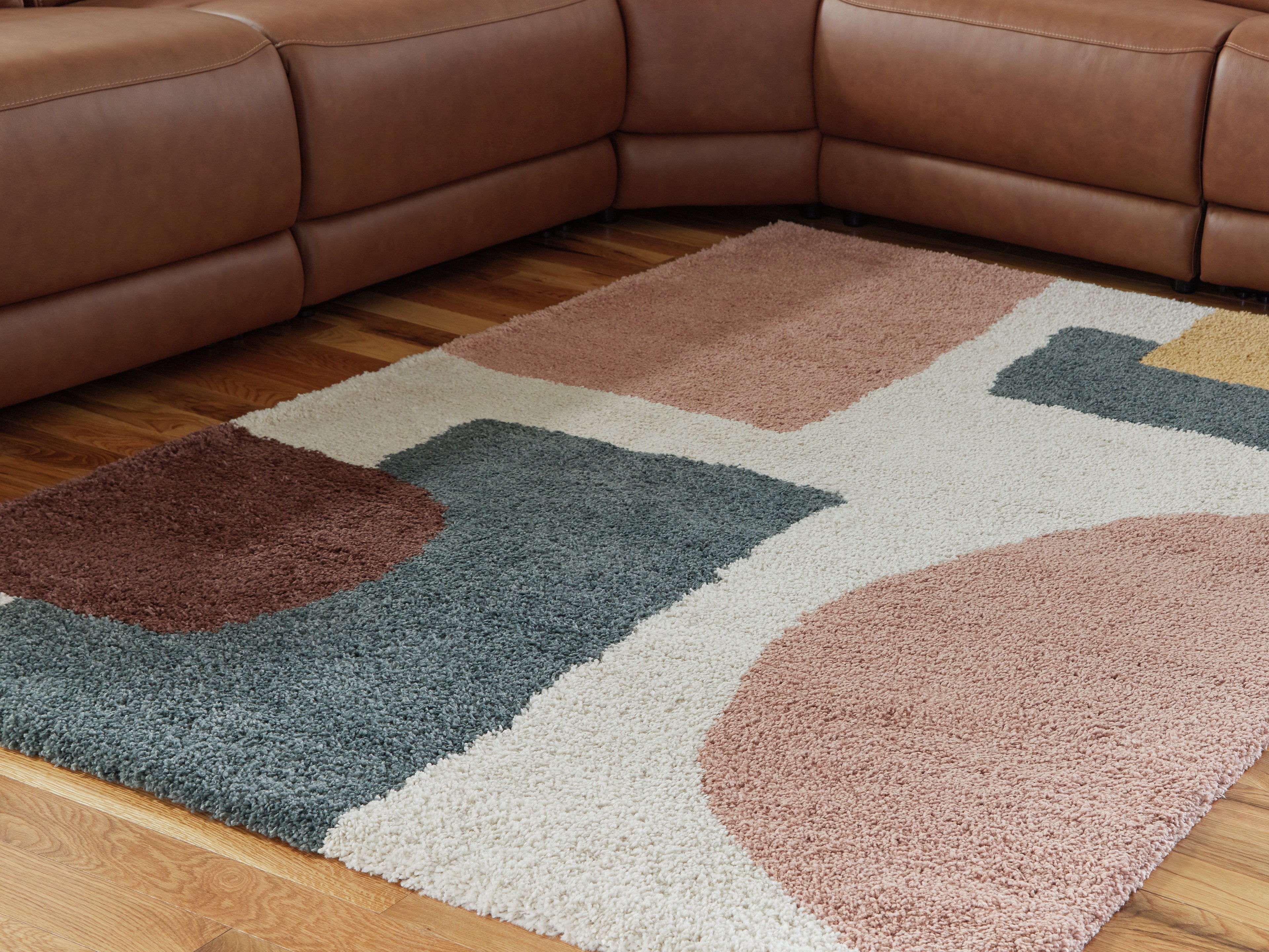 A2Z Furniture - Ashley Furniture - Flynnwick Rug - 5' x 7' Rug / Cream/Pink/Gray - R407182