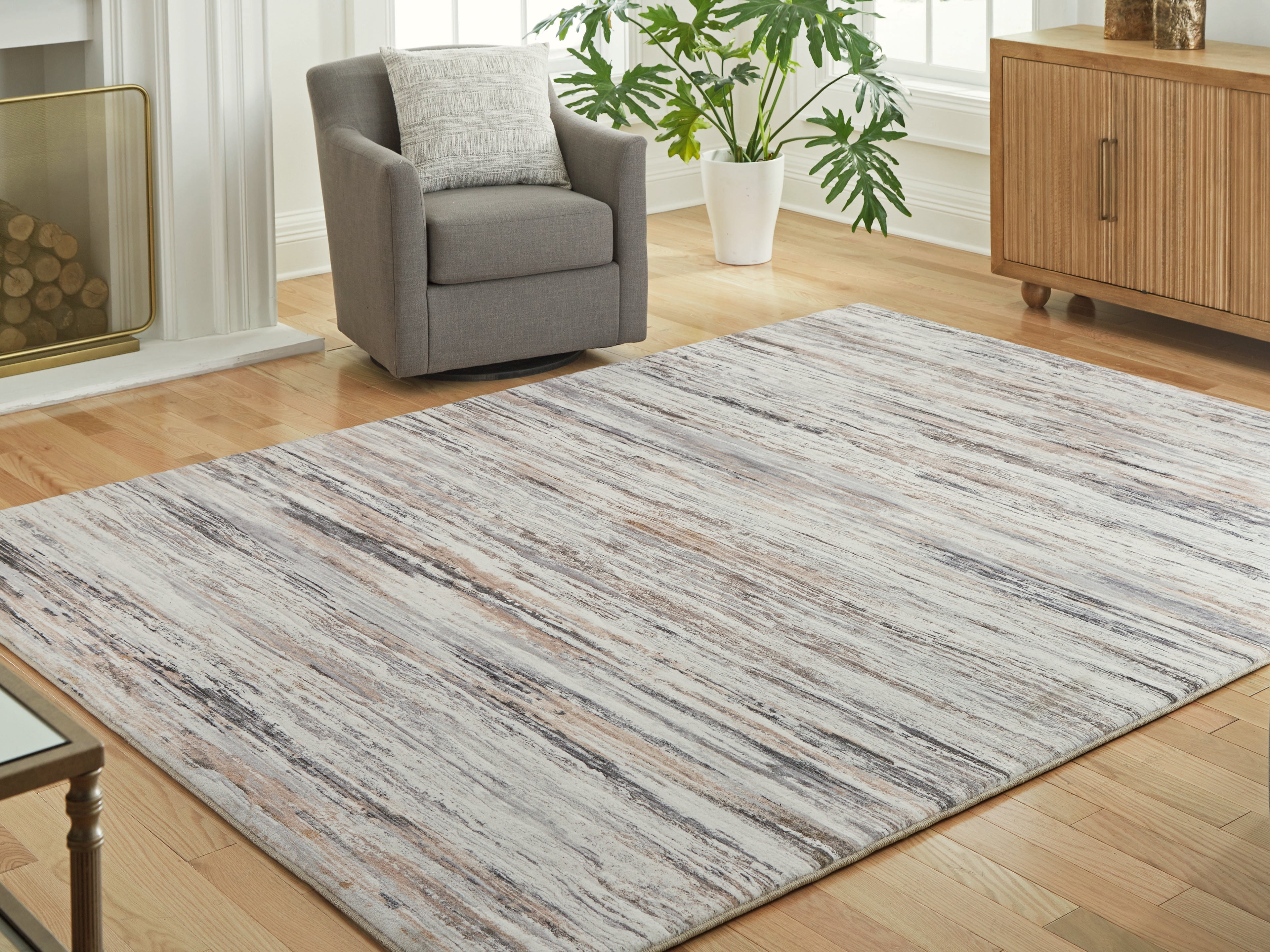 A2Z Furniture - Ashley Furniture - Nace Rug - 7'6" x 9'6" Area Rug / Gray/Brown/White - R407471