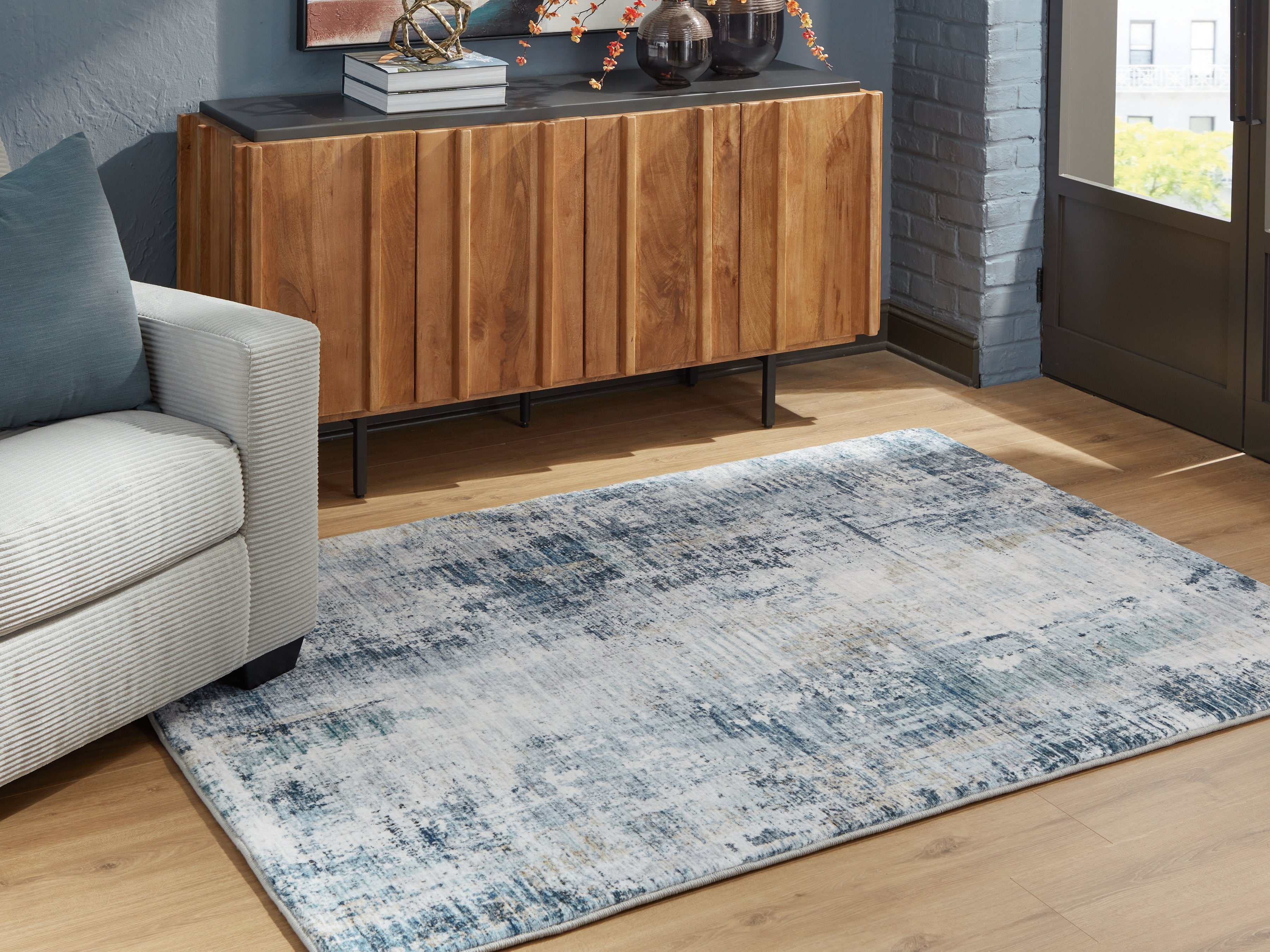 A2Z Furniture - Ashley Furniture - Arlenmont Rug - 5' x 7' Area Rug / Blue/White/Brown - R407482