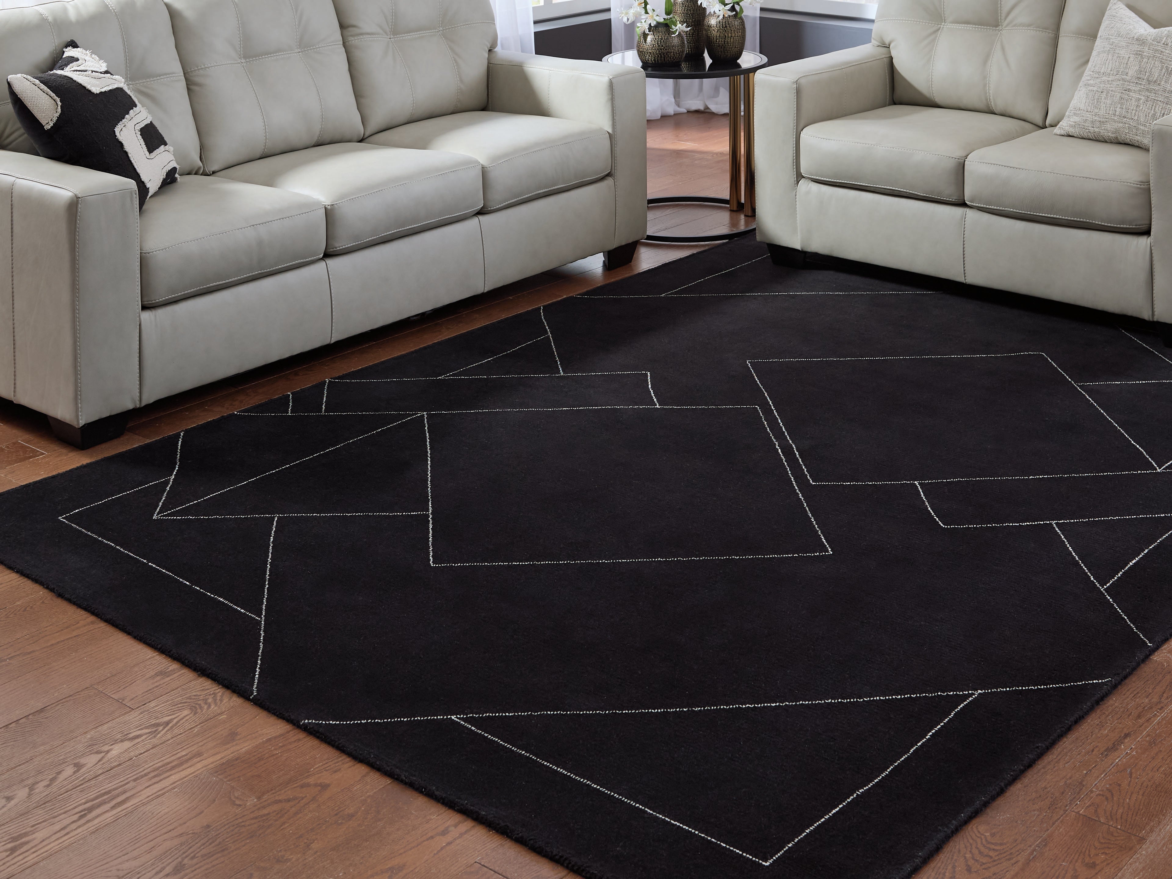 A2Z Furniture - Ashley Furniture - Marav Rug - 7'8" x 10' Area Rug / Black/White - R407531