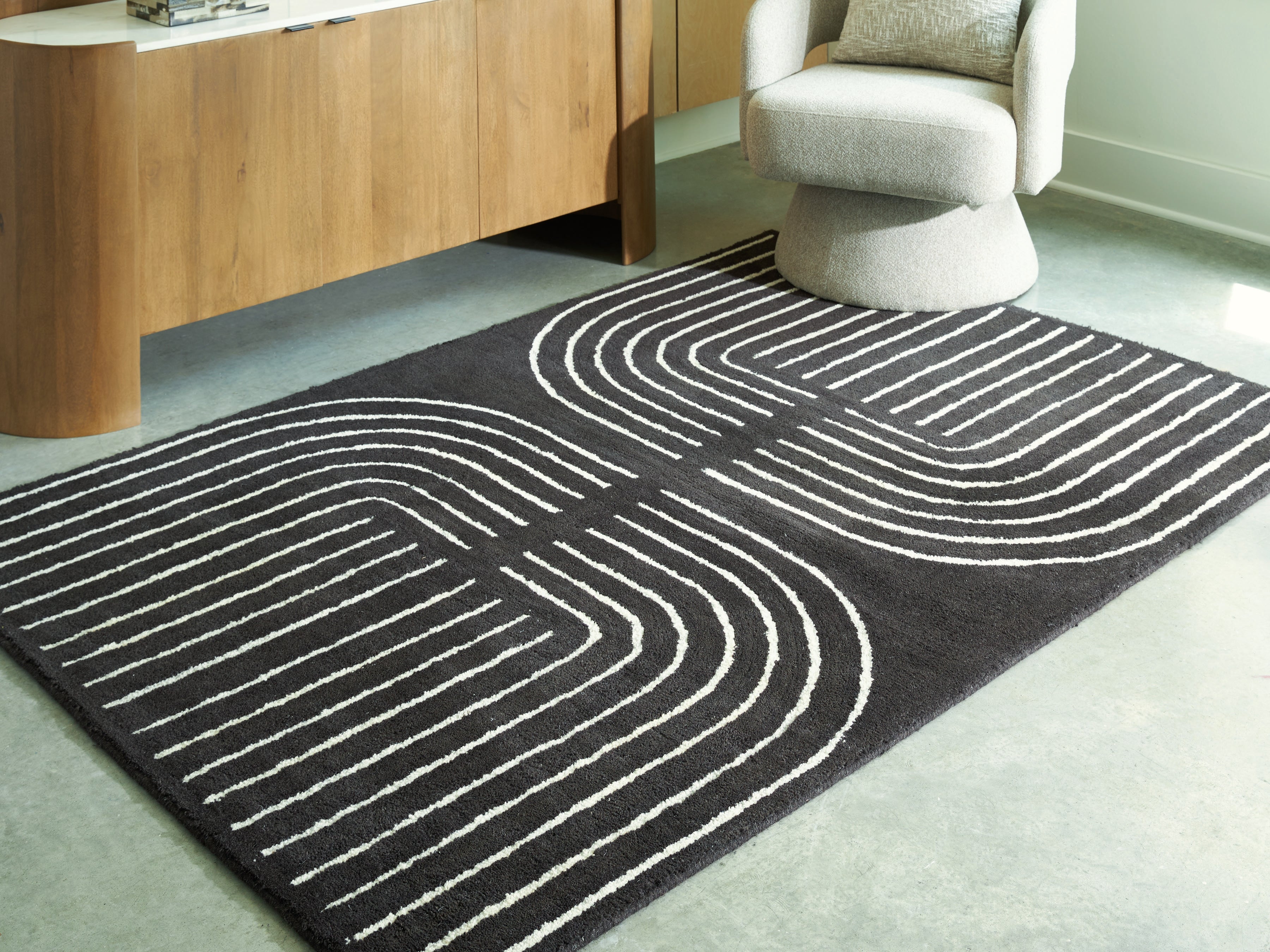 A2Z Furniture - Ashley Furniture - Eldonmore Rug - 5' x 7' Area Rug / Black/Ivory - R407572