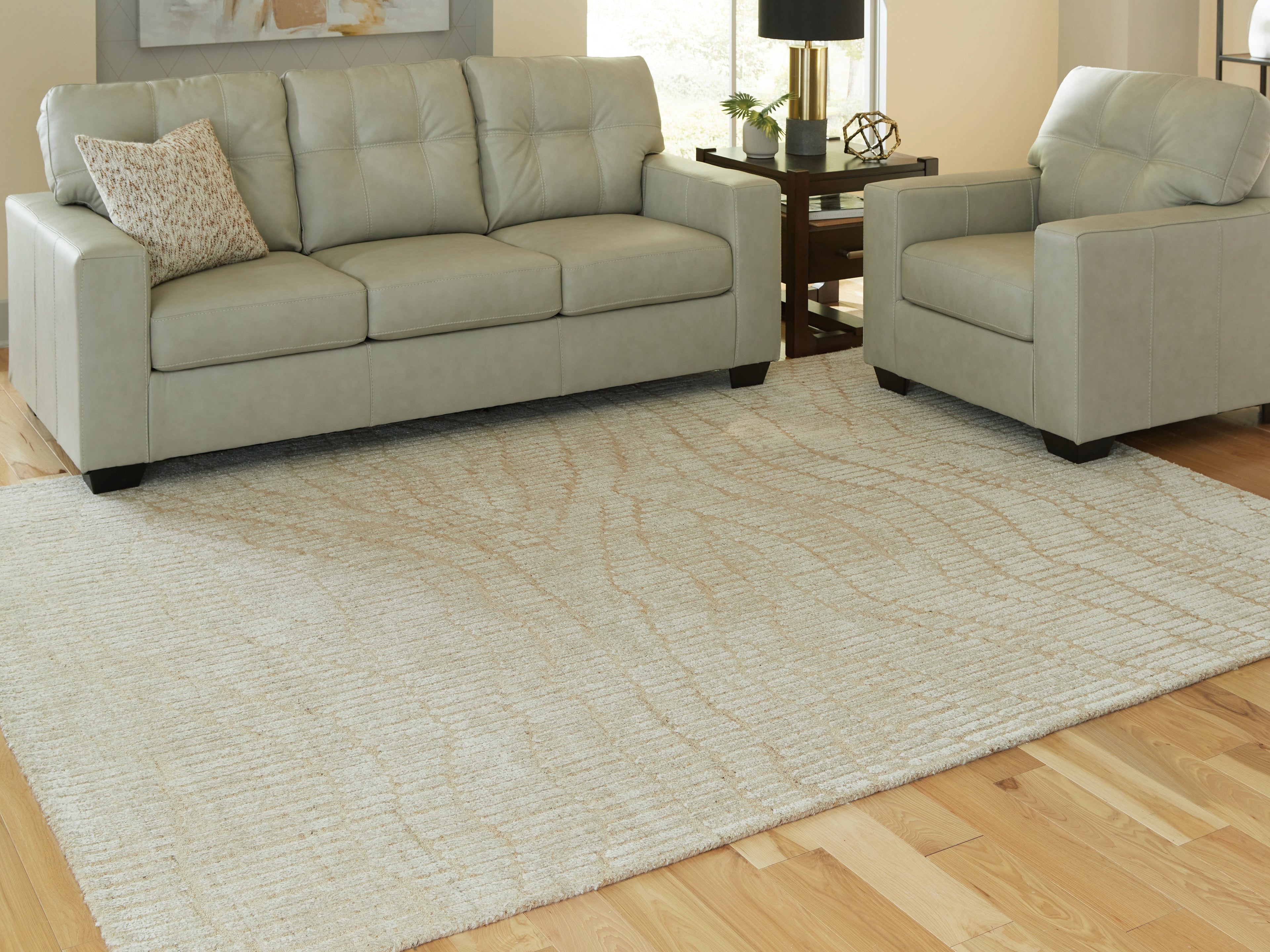 A2Z Furniture - Ashley Furniture - Jaseena Rug - 7'8" x 10' Area Rug / Beige/Tan - R407721