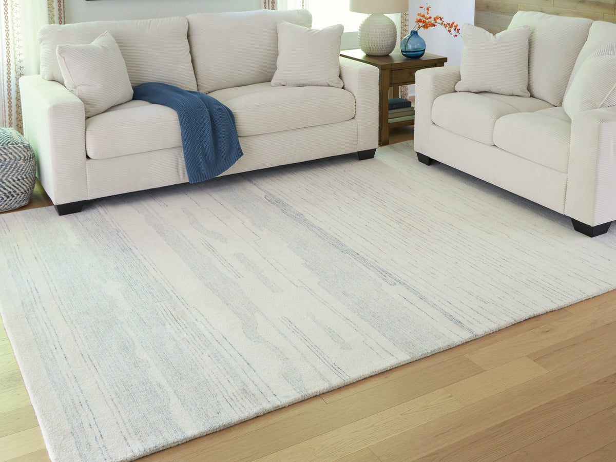 A2Z Furniture - Ashley Furniture - Genemost Rug - 5' x 7' Area Rug / Ivory/Blue - R407842