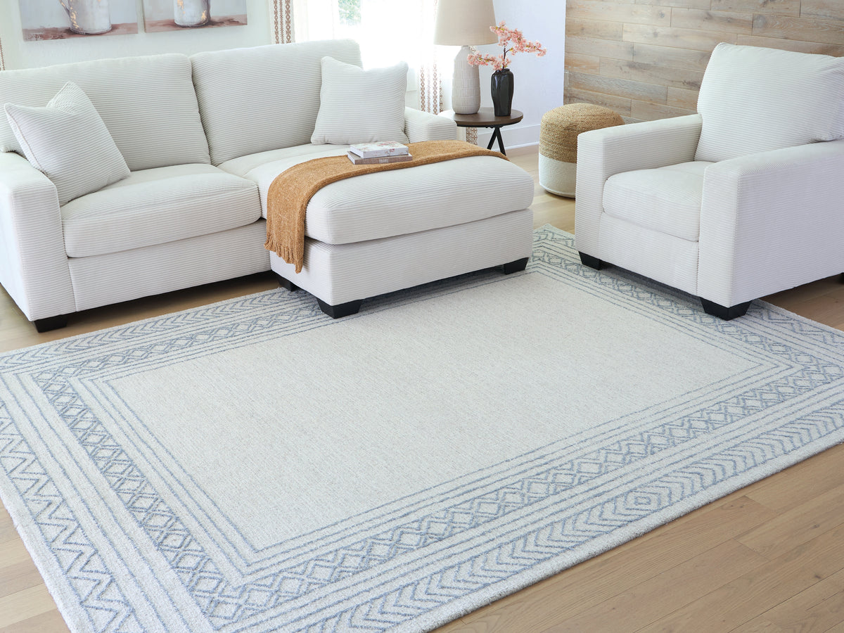A2Z Furniture - Ashley Furniture - Azelhurst Rug - 5' x 7' Area Rug / Blue/Ivory/Gray - R407852