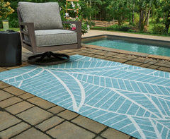 A2Z Furniture - Ashley Furniture - Hulsia Rug - 5' x 7' Rug / Ivory/Aqua - R900122