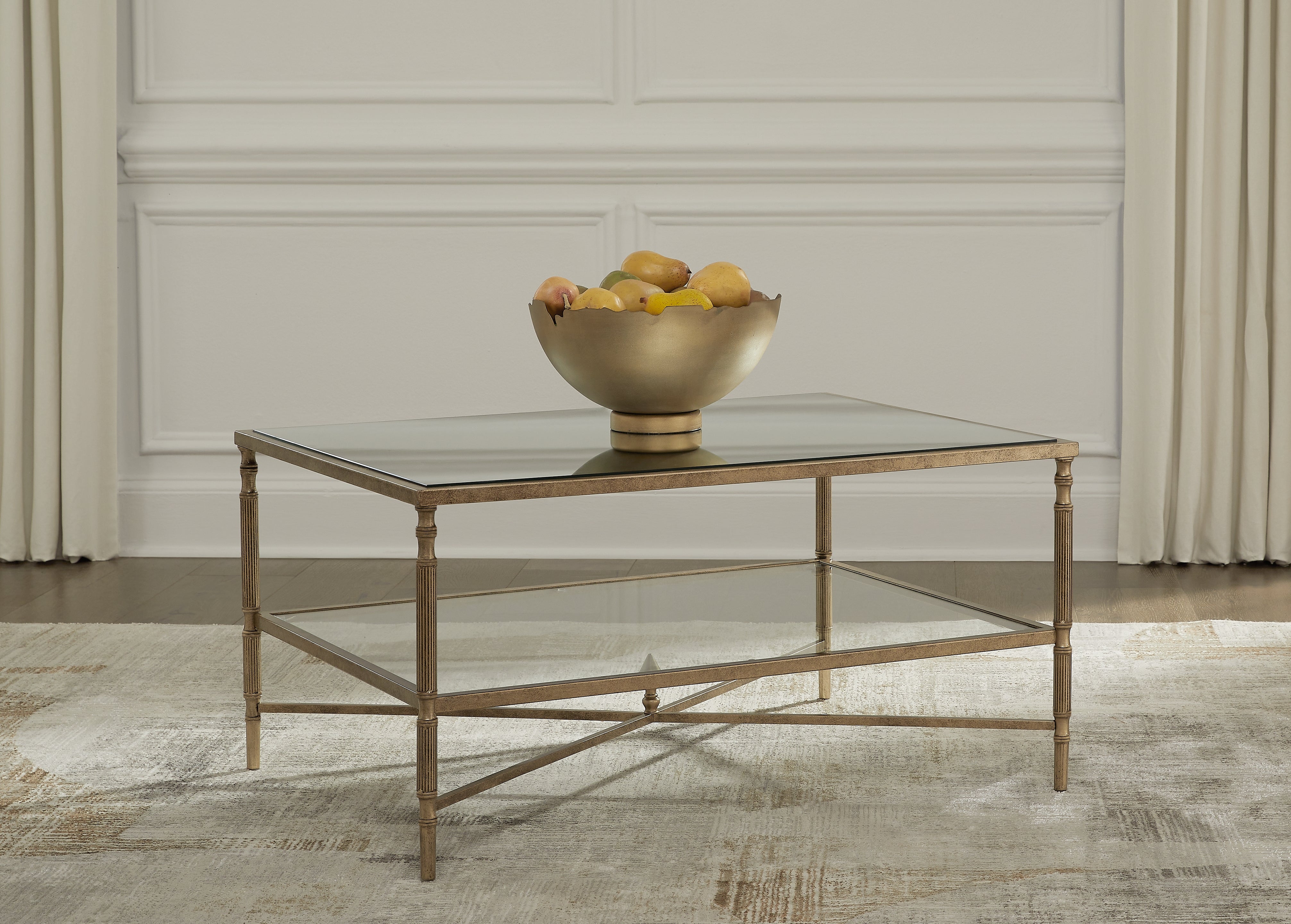A2Z Furniture - Ashley Furniture - Cloverty Coffee Table - Rectangular Cocktail Table / Aged Gold Finish - T440-1