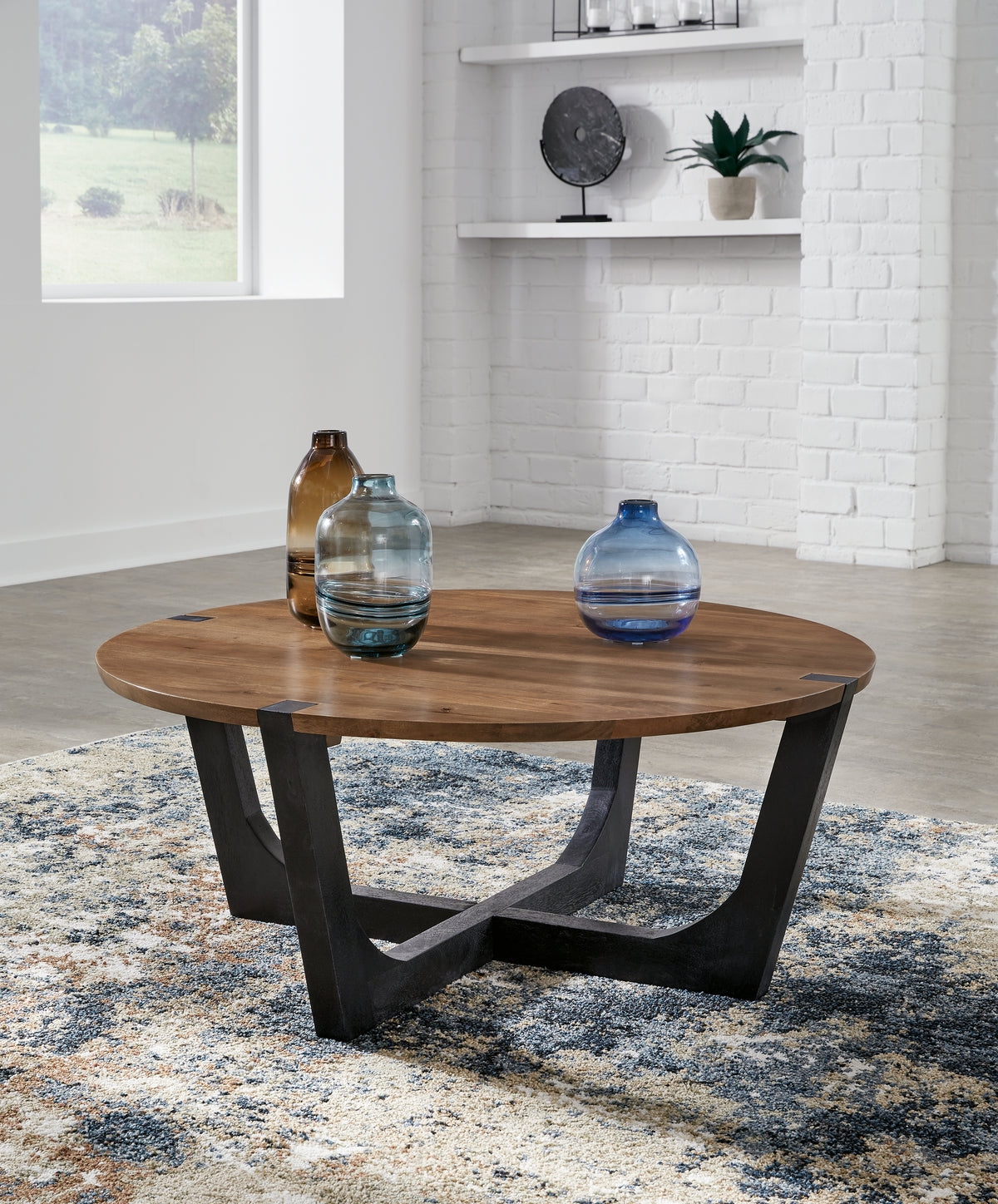 A2Z Furniture - Ashley Furniture - Hanneforth Coffee Table - Round Cocktail Table / Brown/Black - T726-8