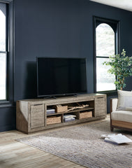 A2Z Furniture - Ashley Furniture - Krystanza 92" TV Stand - 92" / Weathered Gray - W760-78
